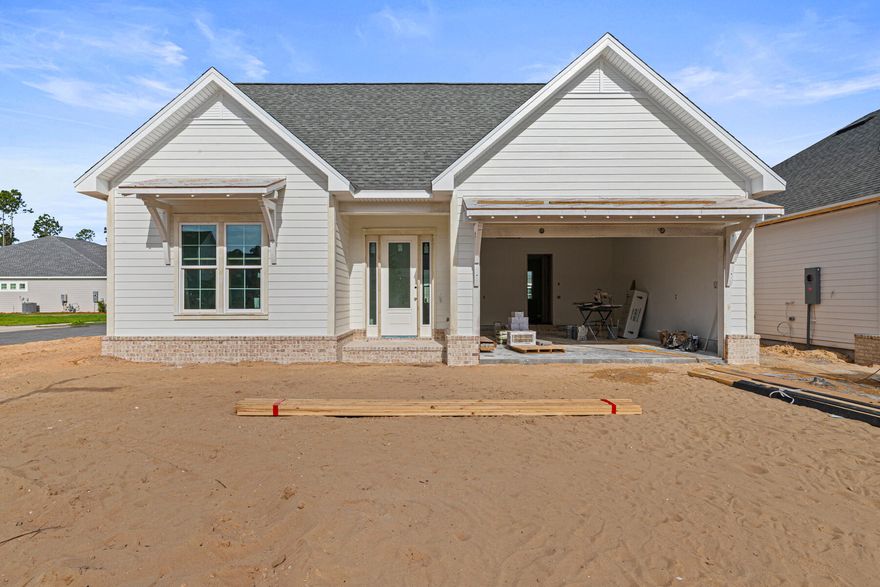 Welcome to the Colt XL by Huff Homes, located in the Longleaf Park neighborhood of Watersound Origins with an estimated completion at the end of April 2026. 

This single-level home offers approximately 1,940 square feet of living space, with 3 bedrooms, 2 full baths, and a 2-car garage. The XL version features an expanded living room and dining area, providing additional space for everyday living and entertaining.

The kitchen includes a quartz countertops, 10 ft island with extra storage cabinets under the overhang, upgraded stainless steel Bosch appliance package with gas range, soft-close cabinetry, and a tile backsplash, and opens directly to the larger living and dining areas. The main living spaces feature 10-foot ceilings, crown molding, and luxury vinyl plank flooring. The Owner's Suite includes a custom walk-in closet and private bath with a tiled shower and quartz vanity. Two additional bedrooms and a full bath offer flexibility for guests or a home office.

A screened rear porch extends the living space outdoors. Additional features include energy-efficient construction, professional landscaping with irrigation, and a 2-car garage.

Located within Watersound Origins, residents have access to the Origins Golf Course, Village Commons pool, fitness center, sports courts, trails, and Watersound Town Center, all within the community.