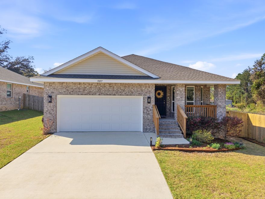 Welcome to this better than new 3 bedroom, 2 bathroom brick home in Northwest Pensacola's Nautical Landing subdivision. Located just 10 minutes from the Navy Federal Campus, and less than a quarter mile from Blue Angel Pkwy for a straight shot to the back gate of NAS Pensacola! This home is packed with high-end updates and features a split floor plan with a front dining room or office space with a beautiful bay window that has tons of natural light and a view of the covered front porch. The gourmet kitchen offers all new stainless steel appliances, granite countertops, upgraded motion-activated faucet, soft-close cabinetry with updated hardware, and a breakfast bar that overlooks the living space. Modern tech flows throughout, from the WiFi-enabled smart thermostat and Ring doorbell to the smart LED under-cabinet lighting and custom wall-mounted shelving. The bedrooms are spacious,  with the primary suite featuring a tray ceiling, an oversized shower/tub combo, and an oversized closet with a custom organization system. All bathrooms have been enhanced with new lighting, soft-close toilet seats, and updated hardware for towels and linens. Outside, the living space expands to a screened-in porch and a newly poured patio. The beautifully landscaped yard is secured with full fencing and features 360 square feet of in-ground raised garden beds serviced by an automated drip irrigation system. You'll enjoy added tranquility and natural beauty on your right side, as it borders the neighborhood's dedicated conservation land. Professional touches continue with Corten steel edging in the front yard, new outdoor garage lights, articulating hose reels, and high, wall-mounted shelving in the garage for maximum storage. Schedule your showing today!