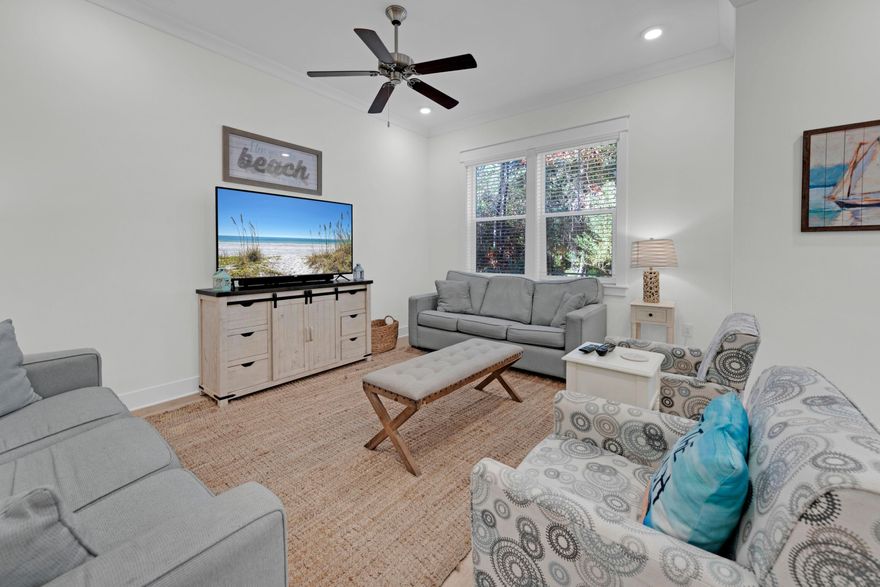 Luxury abounds in this beautifully updated end-unit townhome in Prominence, backing to the tranquil State Forest for added privacy. Featuring 3 spacious bedrooms, a two-car garage, and a paver driveway with ample parking, this home offers both elegance and practicality. The garage easily accommodates a golf cart, bikes, and beach gear, while the laundry room provides extra storage for towels and toys. Inside, light pine floors, fresh décor, and updated furnishings create a soft coastal ambiance. The gourmet kitchen boasts stainless appliances, quartz countertops, and a large island perfect for gathering and meal prep with peaceful forest views. INTEREST-ONLY SELLER FINANCING AVAILABLE UP TO 24 MONTHS!