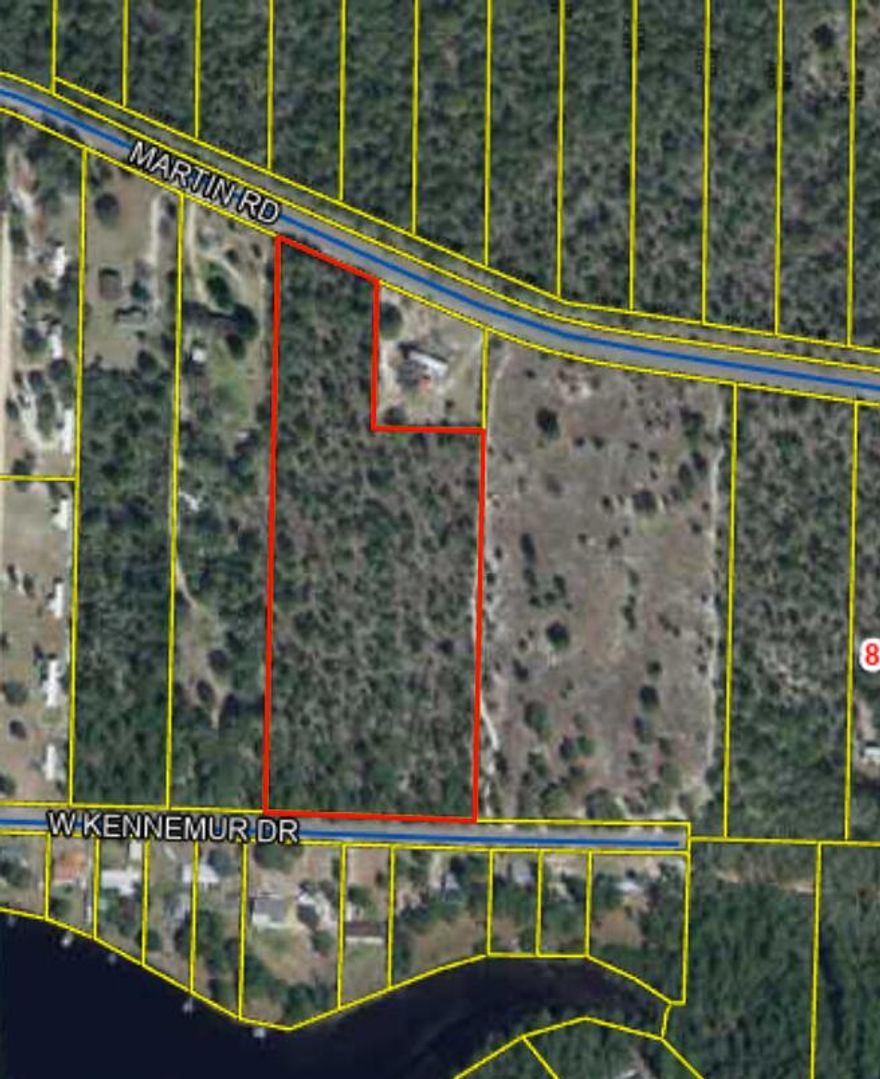 Discover the perfect retreat on approximately 7 acres of gently rolling, lightly wooded land, just a quick 5-minute drive from the heart of town! This picturesque property is not only accessible via a paved road but also surrounded by nature's beauty, featuring several charming lakes and parks nearby. Enjoy the tranquility of rural living while still being less than an hour away from stunning beaches. This is a must-see opportunity to embrace both space and convenience in a delightful setting