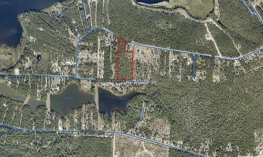 Discover the perfect retreat on approximately 7 acres of gently rolling, lightly wooded land, just a quick 5-minute drive from the heart of town! This picturesque property is not only accessible via a paved road but also surrounded by nature's beauty, featuring several charming lakes and parks nearby. Enjoy the tranquility of rural living while still being less than an hour away from stunning beaches. This is a must-see opportunity to embrace both space and convenience in a delightful setting