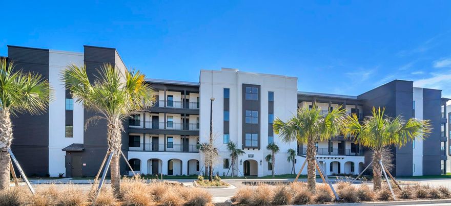 Welcome to luxury coastal living at its finest! This brand new construction condo offers nearly 2,400 square feet of thoughtfully designed space, featuring 4 spacious bedrooms and 4.5 baths, each bedroom with its own private ensuite for ultimate comfort and privacy.

Step inside to find 9 foot ceilings, luxury vinyl plank flooring, quartz countertops, soft close cabinetry, gas range, and high end Bosch appliances throughout the kitchen. Designer touches like decorative barn doors add character, oversized closets, abundant storage included. The unit comes fully furnished and includes a washer and dryer, making it truly turnkey.

Enjoy seamless indoor outdoor living with an oversized balcony overlooking the stunning tropical pools, lazy river, and swaying palm trees. Ideally located right next to the pool, this condo offers one of the best spots in the community.   The Mediterranean style building features elevators for convenience, along with beautifully designed pavilions complete with glass fireplaces, gas grills, and inviting lounge and picnic areas. Cocktails and food service at the pool, launching this summer.  Short term rentals are allowed.  Owners and guests enjoy access to all the amenities at The Grove and Seascape Resort, including golf, tennis, pickleball, and 2,000 feet of pristine beach.  Many restaurants onsite including 2 Birds, ACME Oyster House, Mezcal and the popular beach front Whale's Tail  restaurant.