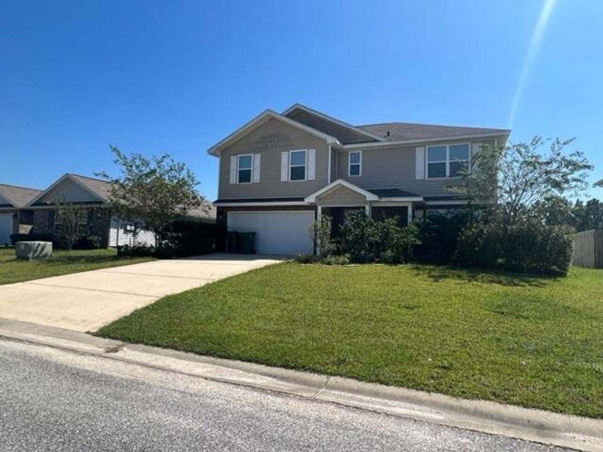 Very nice, spacious home in south Crestview. Home features LVP throughout the first level. An open floorplan and kitchen with large center island, pantry, stainless steel appliances and a pantry. The first floor also includes a half bath and a study/playroom. The back door opens to a huge deck and great sized backyard. Not fenced. Upstairs you'll find 4 bedrooms and 2 full sized bathrooms, as well as a loft space that would be a perfect game room, office or playroom. The large master suite includes a bathroom with separate shower and garden tub, double vanities, water closet and a large walk-in closet. The laundry room is conveniently located upstairs, making the chore a little less daunting. Dryer in unit no warranty. No Smoking or Vaping