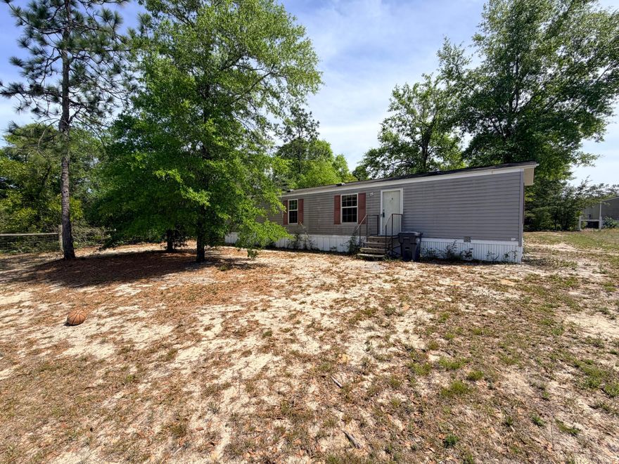 Check out this 2-bedroom, 1-bath mobile home located within 10 miles of historic DeFuniak Springs and less than an hour to the white sand beaches of the Emerald Coast. Enjoy convenient access to Eglin Air Force Base and Duke Field. This solid manufactured home is ready for your personal touch--ideal for first-time buyers, second-home seekers, or investors.

Experience the charm of DeFuniak Springs, known for its historic downtown, the iconic Lake DeFuniak--one of only two perfectly round spring-fed lakes in the world--scenic parks, local shops, and year-round events. A great opportunity to enjoy small-town living with easy access to the coast. Schedule your showing today!