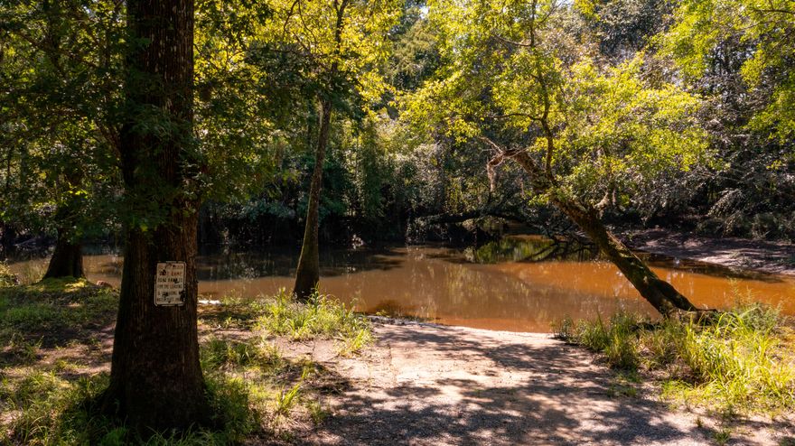 This awesome 2.49 acre parcel is located in the riverfront community of Inlet Retreat. The property is fully fenced and already has power and water on site, making it an ideal setting for a future homesite or a private weekend retreat.

The gated community features a private boat ramp, a covered picnic area, and direct access to Yellow River Water Management Area, offering endless opportunities for outdoor recreation.

This property is ready for your vision. 
Schedule your showing today.