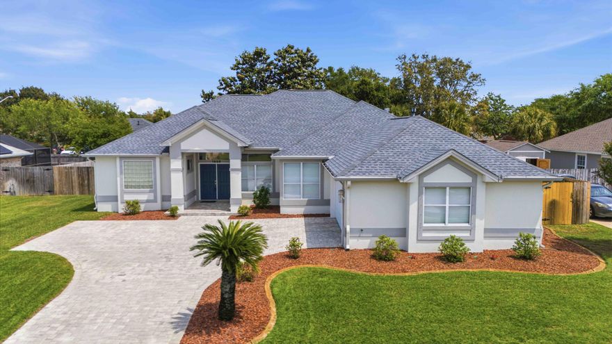 Welcome to La Fontaine, Navarre's elite waterfront community. This 3-bedroom, 2-bath home offers DEEDED WATER ACCESS, timeless architecture, and an exceptional coastal lifestyle. Renovated since 2018, it features formal living and dining, 10-foot ceilings, quartz countertops, a gas log fireplace, and two inviting living areas--one opening to the pool and one just off the kitchen. Outdoors, enjoy a covered lanai, screened gunite pool and hot tub, paver courtyard, and tropical landscaping. Recent updates include a 2023 roof, 2026 HVAC, generator, storm panels, and Rhino Shield exterior coating. Minutes from Navarre Beach--ranked No. 2 in Condé Nast Traveler's 2025 Readers' Choice Awards--plus shops, dining, and Gulf Islands National Seashore. Schedule your private tour today!