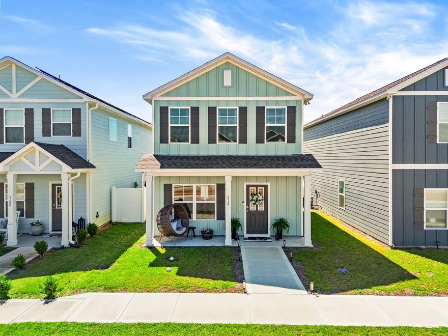 From the moment you open the front door of 352 Arrowwood Blvd, the Cordial floor plan invites you in with a thoughtful, open layout designed for everyday living and easy entertaining. A convenient coat closet sits just inside the entry, and a tucked-away staircase keeps the upstairs private and out of sight. Your eye is drawn straight through the cozy main-level living room to a bright kitchen with pantry -- the heart of the home and the natural gathering spot for family dinners, holiday baking, and casual mornings with coffee.

The main level also features a downstairs bedroom and full bath, perfect as a guest suite, home office, or separate dining area on the main. A back door opens onto a covered walkway that connects you, dry and shaded, to the detached garage -- a smart Florida design that adds curb appeal up front and a usable breezeway out back.

Durable, easy-care flooring throughout the main level: tile and luxury vinyl plank (LVP) in the high-traffic areas, with plush carpet reserved for the bedrooms.

Upstairs is a true private retreat. Two generously sized bedrooms each enjoy their own walk-in closet and en-suite bath -- a rare and highly desirable layout that's ideal for a primary-plus-guest setup, a roommate floor plan, or kids who each want their own space. The upstairs laundry keeps wash day where the clothes already are, and attic access provides the storage Florida homeowners always need. Soft, full carpeting upstairs makes the entire second floor feel warm and quiet.

Step outside and the setting only gets better. A landscaped median runs down Arrowwood Boulevard, putting comfortable distance between you and your neighbors across the street and giving the front of the home an open, airy feel. The sidewalk-lined streets of Owl's Head connect you in minutes -- on foot or by bike -- to two of the community's signature features: the spring-fed community lake on one side, and the large walking park on the other. 352 Arrowwood sits almost exactly equidistant between the two, giving you the best of both amenities right outside your door.

About the Owl's Head community (Freeport, FL). Owl's Head is a 1,600-acre master-planned community along Highway 331 in Freeport, sitting at roughly 100 feet of elevation.You're roughly 16 miles to the South Walton beaches -- Seaside, Seacrest, Rosemary Beach, Alys Beach, Watercolor, and Grayton -- with Destin, Sandestin, Miramar Beach, and Panama City Beach all within an easy drive. Freeport schools, shopping, dining, and the Choctawhatchee Bay are minutes away.