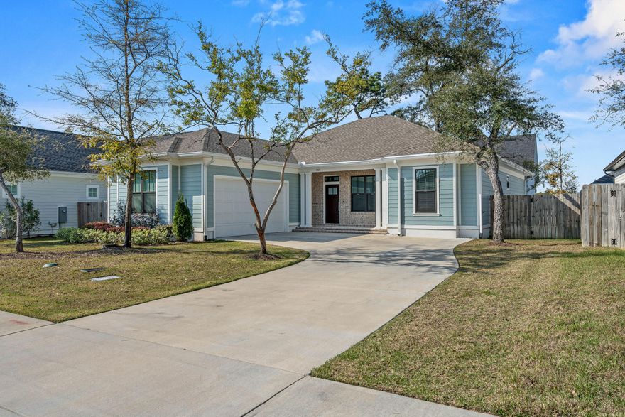 Craftsman style home in Niceville's newest neighborhood, Deer Moss Creek, with 3 bedrooms, 2 baths, AND an office/flex room. Open floor plan - Granite countertops and stainless-steel appliances with luxury vinyl plank flooring throughout home. Impact resistant window and doors with fans in living room & all bedrooms. DMC is a mixed-use community planned to include single-family, multi-family, commercial, a village center, and a light industrial area. A paved trail system is planned to run along the creek. Amenities include a community pool, club house and playground right across the street.