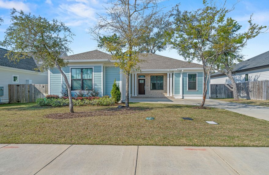 OPEN HOUSE ON SATURDAY 3/28 (10am-2pm) and SUNDAY 3/29 (12pm-3pm). Craftsman style home in Niceville's newest neighborhood, Deer Moss Creek, with 3 bedrooms, 2 baths, AND an office/flex room. Open floor plan - Granite countertops and stainless-steel appliances with luxury vinyl plank flooring throughout home. Impact resistant window and doors with fans in living room & all bedrooms. DMC is a mixed-use community planned to include single-family, multi-family, commercial, a village center, and a light industrial area. A paved trail system is planned to run along the creek. Amenities include a community pool, club house and playground right across the street.