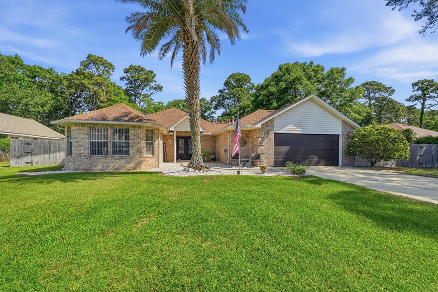 Enjoy your own private, heated in-ground swimming pool in this beautiful home located in the desirable Dana Pointe community. Residents enjoy exclusive access to a private park and boat launch on Choctawhatchee Bay--ideal for relaxing, walking, and enjoying the outdoors.

Step through stunning double iron front doors into a spacious open floor plan featuring no popcorn ceilings. The living area offers new luxury vinyl plank flooring, a cozy fireplace, and built-in shelving. The kitchen provides ample counter space, quartz countertops, and a gas stove. Just off the main living area, a bright, heated and cooled sunroom showcases beautiful views of the backyard and pool.

The generously sized primary suite includes a well-appointed en-suite bath with a separate shower, double vanities with abundant storage, and a walk-in closet with built-in organizers. Two additional bedrooms and a full handicapped accessible bath are located on the opposite side of the home.  Near the kitchen, you'll find a spacious laundry room with extra storage and a convenient half bath.
Recent updates newly replaced pool liner, pump, and heater (2024), and a recently replaced privacy fence (2022). The backyard is a true oasis--perfect for entertaining or unwinding--featuring two storage sheds and plenty of space to enjoy.

Water Heater 2015
Roof 2012
Shed 10 x 20
Shed 8 x 10
Sentricon Termite Bait Stations with Bryan Pest Control