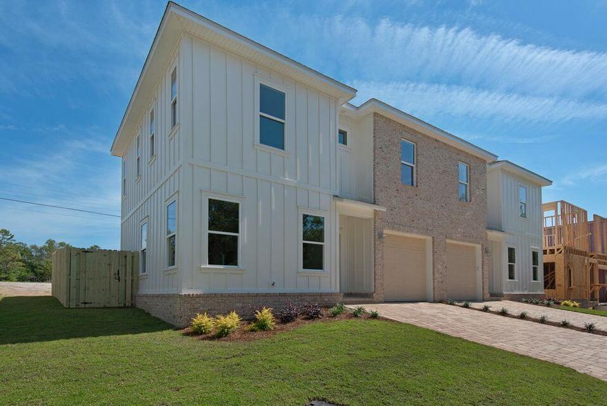 Ideally located less than 2 miles from Eglin AFB with quick access to Duke Field, Hurlburt Field, Navy EOD, and major commuter routes, and of course, the beautiful sugar white, sandy beaches of the Emerald Coast.  This newer construction townhome offers the perfect blend of convenience, comfort, and low-maintenance living. Filled with natural light, the open-concept design features soaring 9' ceilings and thoughtfully selected upscale finishes throughout. Interior highlights include quartz countertops, luxury vinyl plank flooring, all-wood cabinetry with soft-close doors and drawers, Whirlpool appliances, built-in refrigerator, custom closet systems, LED lighting, impact windows, and a sound insulation package for enhanced comfort and efficiency. The spacious primary suite offers a spa-inspired feel with elegant finishes and designer details. Outdoor living is equally inviting with a private paver patio, privacy fence, automated irrigation system, attractive low-maintenance landscaping, and paver driveway. An exceptional opportunity to own a nearly new home in one of the area's most convenient locations.