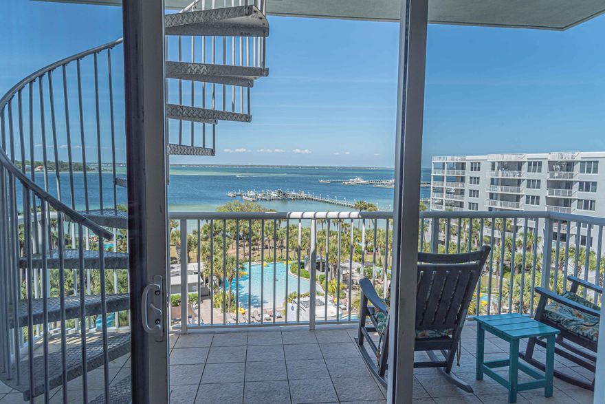 This amazing penthouse unit at Destin West - Pelican offers breath taking views of the bay, the lazy river and the Gulf.  This unit is fully equipped and ready for immediate use.  It is fully equipped featuring stainless steel appliances, a 60-inch flat screen tv, custom furniture and decor, king size bed in the master and double bunks with built in TVs in a separate bunk room.

With stunning views of the bay and the lazy river from your living room or balcony, you can peacefully enjoy the wonders of the Emerald Coast.  This penthouse unit also features a private roof top area that is accessible from the balcony. The rooftop area includes a gas grill, and panoramic views of the Gulf, bay and the lazy river.