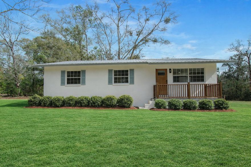 Completely renovated and move-in ready, this 4-bedroom, 2-bath home is located just minutes from the historic heart of downtown DeFuniak Springs. Taken down to the studs and thoughtfully rebuilt, the home offers the charm of a classic ranch with the peace of mind of major system upgrades already completed. Recent improvements include a new HVAC system, new water heater, LVP flooring throughout, new doors, new cabinetry, fresh paint, new stainless-steel appliances, recessed lighting, updated fans and fixtures, and large-format tile in both bathrooms. The bathrooms have been fully refreshed with new showers, vanities, and toilets, offering a clean, modern feel.

Situated on a spacious .43-acre lot, the large backyard offers privacy and plenty of room to enjoy outdoor living, create a garden, entertain guests, or simply relax in your own space. Conveniently located near local shops, restaurants, parks, schools, and the iconic Circle Drive, this home provides easy access to everything DeFuniak Springs has to offer while delivering the durability and strength of solid concrete block construction. This is a rare opportunity to own a fully updated home in a desirable in-town location.