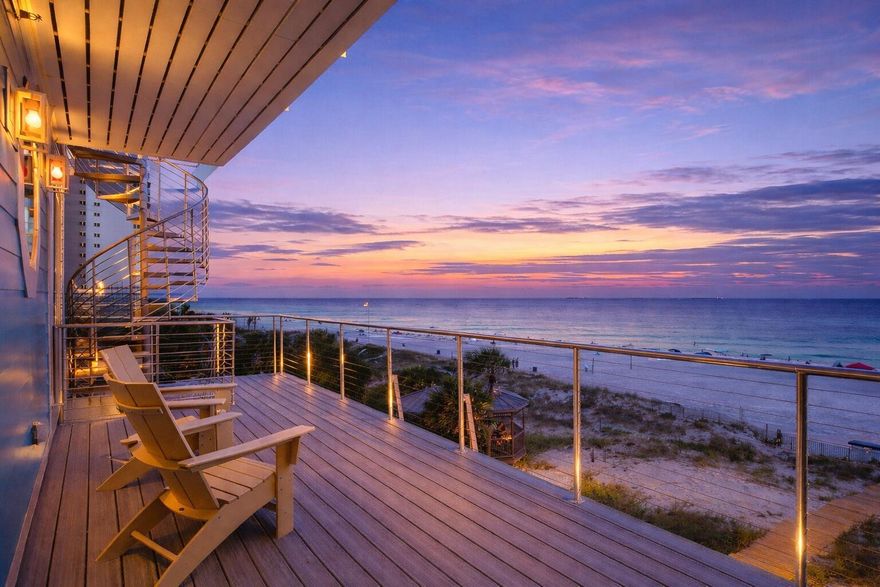 7 bedroom, 8.5 bath Gulf-front beach house in Panama City Beach with a heated private pool, parking for up to 9 vehicles, and no HOA restrictions. Built in 2025 and offered fully furnished, the home combines direct beachfront living, large gathering spaces, and high-end finishes for buyers seeking a luxury second home, private retreat, or income-producing property. Seller states the property has more than $200,000 already booked for 2026 and is projected to generate up to $400,000 annually.

The main living area features an approximately 30 x 30 open layout designed for large groups, with Gulf views from nearly every angle. The chef's kitchen is centered around a 10 x 5 island with granite slabs imported from Brazil, dual refrigerators, wraparound seating, and a 75-inch wall-mounted TV. The home also includes 12 smart TVs, a 412-game arcade console, and a third-floor entertainment lounge with space for movie nights, games, a pool table, or air hockey. The primary suite includes 16-foot ceilings, chapel windows overlooking the Gulf, and a private lounge area with a coffee and wine bar.

Freshly styled with more than $150,000 in designer furnishings, accessories, and custom window treatments, the home delivers a turnkey Gulf-front experience. Hurricane-impact windows, a 10-foot sliding glass door, and triple-pane Therma-Tru doors are designed to capture the views while adding protection from coastal weather. A commercial-grade fire suppression system with 24-hour monitoring adds another layer of safety throughout the home and outdoor spaces.

Outdoor living is a major feature, with an approximately 30 x 25 beachfront deck overlooking a heated 12 x 23 Gulf-front pool with an 8 x 6 sun shelf and two heaters. A powder-coated aluminum safety fence helps secure the pool area without blocking the Gulf view, and reinforced balcony railings provide added peace of mind. The lot extends all the way to the wet sand, creating a rare stretch of usable beachfront directly behind the home. There is also room for jet skis and other beach gear.

Seller states this is the first beachfront home on Panama City Beach built on 12 x 12 concrete pilings driven 20 feet deep rather than traditional wood pilings. The exterior also features Hardie Board siding secured with stainless screws and a rust-resistant aluminum roof designed to last 30 years or more. Located minutes from Pier Park and near the soon-to-open Tootsies, Top Golf, and Dolly Parton's Pirates Voyage. Buyer to verify all dimensions, bookings, income projections, and future development timelines.