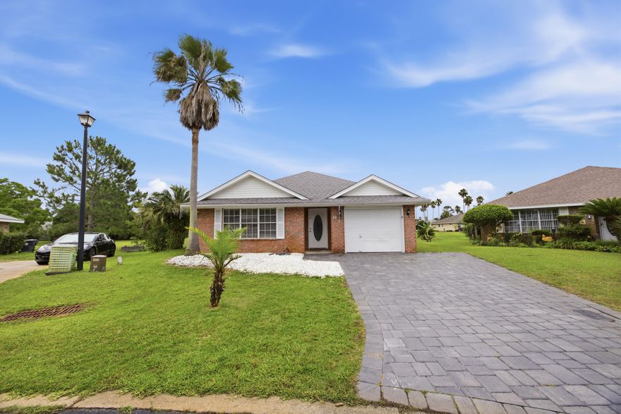 Located in the heart of Miramar Beach, Florida, 43 Mandevilla Lane offers a rare combination of coastal living, convenience, and community amenities just minutes from the sugar-white sands of the Emerald Coast. Situated less than five minutes from Geronimo Street public beach access and approximately one mile from scenic Gulf-front walking areas, this home places you close to the beach while maintaining easy access to shopping, dining, healthcare, and entertainment. This Miramar Beach home is conveniently located near Silver Sands Premium Outlets, Grand Boulevard at Sandestin, Destin Commons, Sacred Heart Hospital, and multiple local restaurants and grocery options. With direct access to Highway 98 and a traffic light positioned at the neighborhood entrance, commuting through Destin and Miramar Beach is simplified without difficult median crossings or U-turns.

Residents of this amenity-rich community enjoy access to a resort-style swimming pool, tennis courts, picnic pavilion, overflow guest parking, and community water access featuring a bayfront dock with seating. The HOA is actively improving the neighborhood with plans for a new playground and additional bayfront enhancements, adding long-term value and appeal for both homeowners and investors.

Inside, the home features high ceilings and an open-concept living area designed to maximize natural light and functionality. Interior upgrades include travertine flooring, fresh paint throughout, updated hardware, and new ceiling fans in every room. The kitchen is equipped with stainless steel appliances, while the oversized primary closet and interior washer and dryer hookup provide practical everyday convenience.

Outdoor living is enhanced with a screened-in patio featuring a finished floor, an oversized paver driveway, gutters, and partial hardscaping already in place. Major mechanical improvements provide peace of mind with a new roof installed in 2022, HVAC system replaced in 2023, and hot water heater updated in 2023.

Whether you are searching for a primary residence in Miramar Beach, a second home near the Gulf, or an investment property close to Destin's beaches, shopping, and attractions, 43 Mandevilla Lane offers location, updates, and lifestyle in one of the Emerald Coast's most desirable areas.