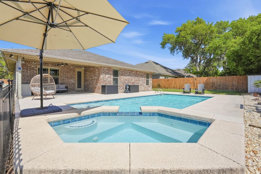 Like-new, expansive brick POOL home in the highly sought-after Poquito Bayou! Offering 5 bedrooms, 3 bathrooms, and 2,794 square feet, this beautifully updated residence is just minutes from the Poquito Boat Ramp--perfect for enjoying the coastal lifestyle.

Designed with both comfort and style in mind, the home features wood-look tile flooring, tray ceilings, crown molding, 9-foot ceilings, and 8-foot doors throughout. The open-concept layout and split floor plan provide an ideal balance of functionality and privacy.

At the heart of the home, the chef's kitchen impresses with quartz countertops, a large island, glass tile backsplash, soft-close cabinetry, and stainless steel appliances, including a gas range with hood.

The spacious primary suite overlooks the pool and includes a versatile adjoining office accessed through stylish barn doors. Four additional generously sized bedrooms and two full bathrooms are thoughtfully positioned on the opposite side of the home.

Step outside to your private backyard oasis, complete with a sparkling pool--perfect for entertaining or relaxing. Additional upgrades include new appliances, a new pool pump and filter, and a whole-house generator for peace of mind.

Be sure to review the feature sheet for a full list of updates, and schedule your private showing today!