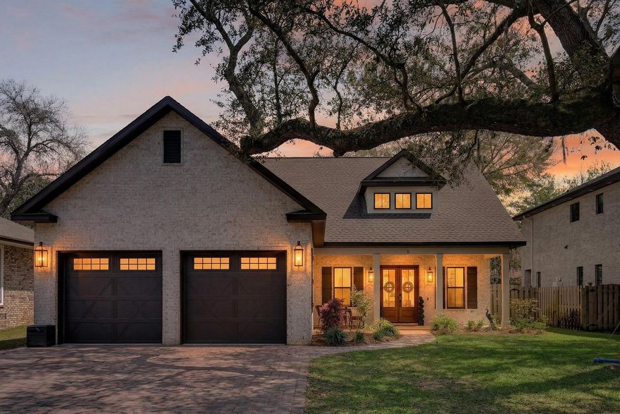 Built in 2021 by renowned local builder Damian Curtis, this 2,649-square-foot home with 4 bedroom + office and 2.5 baths blends timeless Southern charm with modern comfort. Ideally located on a gorgeous oak tree lined street and surrounded by all newly built homes. This home offers easy access to Hurlburt Field and Eglin Air Force Base, and just minutes from the sugar-white sands of Okaloosa Island, it offers the perfect balance of convenience and coastal living. Evenings can be spent by the water, toes in the sand, watching breathtaking sunsets over the Santa Rosa Sound--an everyday reminder of what makes this area so special.

Nestled on a quiet cul-de-sac in Plantation Oaks beneath a canopy of mature live oaks, the home was designed with both elegance and livability in mind. The open-concept living and dining areas create a natural gathering space for entertaining or simply enjoying everyday moments. A striking oversized gas fireplace with a shiplap surround and custom built-in shelving draws the eye upward to 10-foot ceilings, setting the tone for the home's refined yet comfortable style.

The chef's kitchen is both elegant and functional, filled with natural light and featuring crisp white shaker-style cabinetry, brushed metal hardware, under-cabinet lighting, and light quartz countertops. A gas cooktop with a convenient pot filler makes meal prep effortless, while the marble and glass mosaic backsplash--designed in a geometric floral pattern with soft whites and grays--adds texture and timeless sophistication.

Just off the main living area, the private first-floor primary suite offers a peaceful retreat. The spa-like ensuite includes a soaking tub, glass-enclosed walk-in shower, dual vanities, a private water closet, and generous walk-in closets.
A thoughtfully designed laundry and mudroom off the oversized garage creates an ideal transition space for daily life, blending practicality with organization.
Upstairs, three spacious bedrooms, a full bath, and a versatile office or flex space overlooking the front of the home provide room to grow, work, and relax. Additional walk-in attic storage with flooring makes staying organized simple and convenient. You could also finish the attic room into more living space such as another bedroom, cinema room, craft room or play room and it would add another approximately 800 square feet of living space. 

Residents of Plantation Oaks enjoy access to a neighborhood walkway easement leading to the Intracoastal Waterway, where the beauty of the Santa Rosa Sound invites you to unwind, explore, and experience the very best of Emerald Coast living.