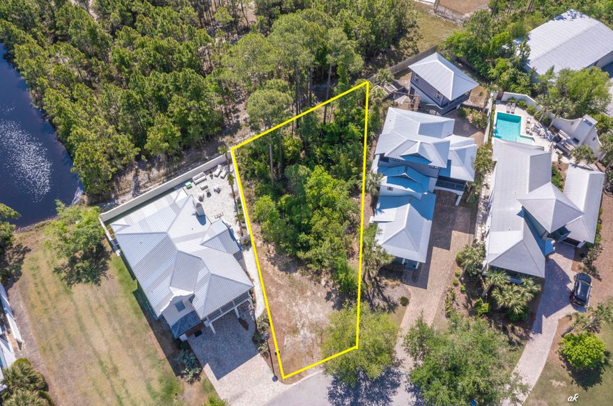 Build your dream home at 5309 Hometown Lane in the exclusive, gated community of Martinique! Located on the quiet East End of Panama City Beach, Martinique is highly sought after for its classic ''Old Florida'' charm, peaceful nature trails, and freshwater lakes. It's a very golf-cart-friendly neighborhood packed with great amenities, including an island-style community pool, a pavilion, a playground, and a basketball court. The location is unbeatable. You're just a short ride away from the white-sand beaches of St. Andrews State Park, the Grand Lagoon, Lighthouse Marina, and local waterfront staples like Captain Anderson's and The Grand Marlin. This is a great opportunity to secure a prime, buildable lot in one of PCB's best neighborhoods.