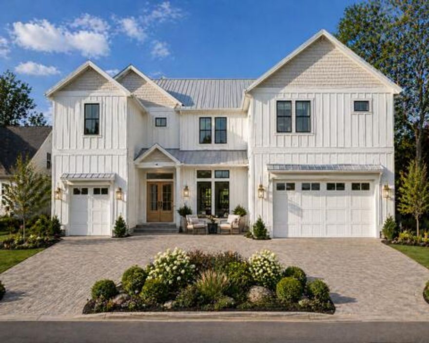 Tucked into Point Washington just minutes from the sugar-white sands and 1 mile from the tranquil bay waters, this 5,300± SF custom home -with a fully independent carriage house- delivers what is rare this close to Scenic Highway 30A: expansive living, refined luxury, and true flexibility. Inside, the home unfolds with effortless scale and sophistication. Soaring 12-foot ceilings, wide-plank white oak floors, and a dramatic 66-inch linear direct vent gas fireplace wrapped in floor-to-ceiling cream fluted stone create a striking focal point. White oak beams in the primary suite and upstairs game loft add warmth and architectural character. The chef's kitchen is designed for both daily ease and elevated entertaining, featuring professional-grade Thermador appliances, a 48-inch gas range, ... and a butler's pantry that keeps preparation and service seamlessly out of sight.
The main-level primary suite is a private retreat, offering boutique-style luxury with a spa-inspired bath designed for quiet restoration after days on the water or beach. Upstairs, the home transitions into dynamic living with a vaulted game area, media-ready bonus room, and dedicated fitness space--each designed to support both connection and separation.

A defining feature is the fully independent carriage house, complete with private entrance, full kitchen, living area, laundry, and private suite. This flexible space is ideal for extended family, long-term guests, or a private office retreat.

Outdoor living is equally refined, with covered patio and entertaining space, a summer kitchen, and a clean-lined pool and spa designed for relaxed coastal gatherings that extend into the evening. An oversized garage provides ample room for a boat and coastal gear, making spontaneous bay days effortless.

This is home is Point Washington at its finest--open, refined, and adaptable living just moments from 30A, yet quietly removed into a setting that feels entirely your own.