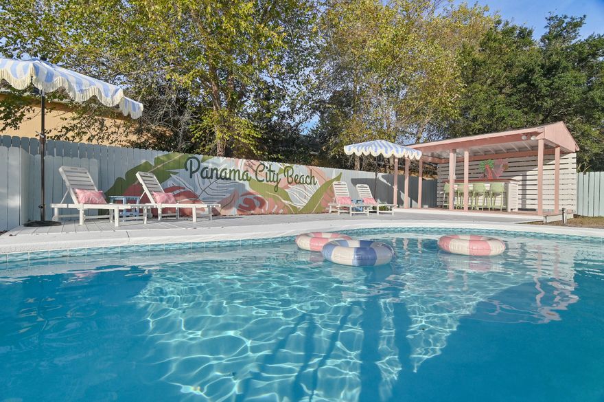 Tucked away on the quiet west end of Panama City Beach, just a short stroll to sugar-white sand, this fully renovated, turnkey coastal investment is ready to generate income from day one. Being sold completely furnished, it's set up for immediate short-term rental success with no downtime. This 3 bedroom + bunk room is ready for success!

The home features a bright, open layout with vaulted ceilings, a split floor plan, and seamless indoor-outdoor living. Guests will love the private pool and screened-in porch, ideal for maximizing rental appeal.

Situated on a rare ¼-acre lot with no HOA and short-term rental approval, this property offers flexibility and strong upside. A brand new roof adds peace of mind.

All measurements are approximate. Buyer to verify all details.