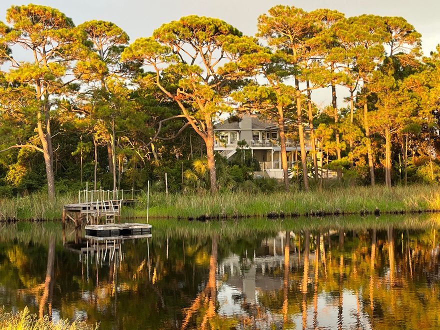1.56 acres on Oyster Lake with Gulf views, sunset-facing exposure, and parking for 14+ vehicles - this is a 30A opportunity that's nearly impossible to replicate.
Originally built in 1994 and updated over time, the residence offers over 3,000 square feet with 5 bedrooms and 4 full bathrooms, along with a versatile bonus room ideal for a game room, media space or additional living area.  The layout is both comfortable and functional, ready to enjoy as-is or tailor to your vision.
Perfectly positioned to embrace its surroundings, the home captures expansive views across Oyster Lake with the Gulf shimmering beyond, setting the stage for stunning sunsets each evening.  Whether relaxing on the deck or in the heated, saltwater pool overlooking the lake, the setting feels immersive and serene... Inside, the primary suite, kitchen, living, and dining areas are all thoughtfully oriented to the water, creating a seamless connection between indoor and outdoor living.
What further distinguishes this property is how effortlessly it blends lifestyle and functionality.  A private dock on Oyster Lake invites easy days on the water, from paddleboarding at sunrise to kayaking at sunset.  The residence itself sits high and dry in Flood Zone X, while the 1.56-acre homesite provides a level of privacy rarely found along 30A. A 3-car garage, parking for 11+ additional vehicles, and an RV pad with electric, water, and sewer hookups offer exceptional flexibility.
Just a 6-minute walk to the beach, this home allows you to enjoy the 30A lifestyle without the hassle of public parking.  Spend the morning on the sand, return home for lunch, and head back with ease. With three convenient access points to Highway 98, you'll also benefit from smooth connectivity without the typical traffic challenges.
The views are protected, the setting is peaceful, and the combination of acreage, waterfront, and proximity to the Gulf is truly exceptional.