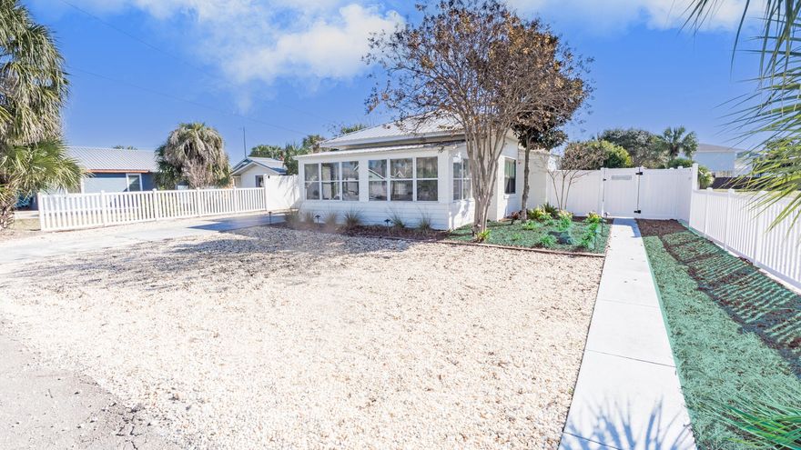 Welcome to Casita Castor - Your Beachside Paradise in Bid-A-Wee Beach! Discover the charm of this beautifully renovated 3-bedroom, 1-bath cottage, located just 100 steps from the private, gated Bid-A-Wee Beach. With five exclusive beach access points, this home offers the perfect blend of coastal living and modern convenience. Key Features: Completely Renovated: Taken down to the studs in 2023/2024, this home boasts updated electrical and plumbing systems, a gas tankless water heater (2023), a newer HVAC system (2020), and a durable metal roof (2018). Move-in ready and designed for peace of mind! Spacious Lot: Situated on a generous 60' x 150' lot, the property offers endless possibilities. Add a master bath, carriage house, or even a pool - the choice is yours! (Ask about approved drawing Flexible Layout: The back room, currently used as a storage area; but, can easily be transformed into a cozy bunk room for a third bedroom. Outdoor Privacy: Enjoy the newly installed white vinyl fence (2024) that creates a private backyard oasis. Coastal Comforts: Fully furnished and rental-ready, Casita Castor is perfect for weekly rentals or as your personal beach retreat. Start your mornings with coffee in the sunroom and end your evenings watching breathtaking sunsets. Prime Location: "Pier Park, Top Golf, and Dolly Parton's Pirate Adventure: Less than 2 miles away "Scenic 30A: Just 9 miles away "Golf cart-friendly area with easy access to the best of Panama City Beach Bid-A-Wee Beach is a hidden gem with no HOA, offering a serene and private coastal lifestyle. Don't miss the opportunity to own this stunning beach cottage at 603 Argonaut Street. Schedule your showing today and make Casita Castor your new favorite place to be!