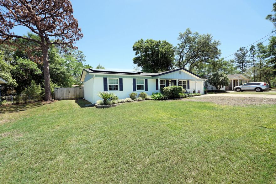 Here is your opportunity to own a home in highly desirable Shalimar, Florida! Only minutes from Eglin AFB and the most beautiful beaches along the Gulf Coast, this home is going to offer you the coastal lifestyle you're looking for! A classic Florida-style cottage, this home has four bedrooms and two full, recently renovated baths. The family room opens to the dining area and kitchen, making for an ideal entertaining space. The current owners use one of the bedrooms as a music room, as it is adjacent to the family room and is connected by french doors. Down the hall are the two other guest rooms, as well as a full bath. The primary bedroom is at the rear of the home, with an attached bath. Off of the dining area is a screened porch, which will see a lot of use! (Click More . . .) Then, you'll make your way out to the separate 12x12 screened room, which is home to a large hot tub! The backyard has privacy fencing--so grab your beverage of choice and dash out to enjoy a relaxing soak! Roof, Water Heater and HVAC have all been replaced within the last 5 years. Solar panels were added after the roof was replaced--so your electric bill is typically just the basic connection fee (approximately $30/month, with a bump in Jan & Feb to approximately $60).