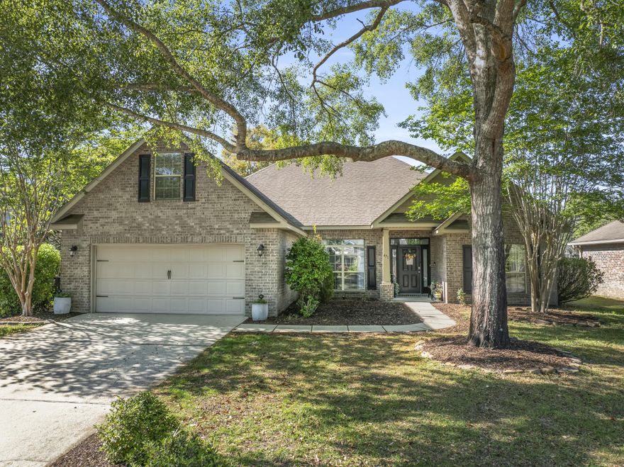 Discover lakeside luxury in this stunning all-brick home in the sought-after Hammock Bay community. Featuring 4 bedrooms plus a versatile bonus room, this property offers serene water views and resort-style amenities.
Enter through the beautiful front door with transom into a bright foyer showcasing new vinyl laminate flooring, 9' ceilings, and elegant crown molding. The spacious great room boasts vaulted ceilings and French doors leading to a covered 12x14 back porch - perfect for enjoying the tranquil lake views.
The gourmet kitchen features tile floors, wood cabinets, stainless steel appliances, and a breakfast bar overlooking the water. The waterfront master suite delights with a
