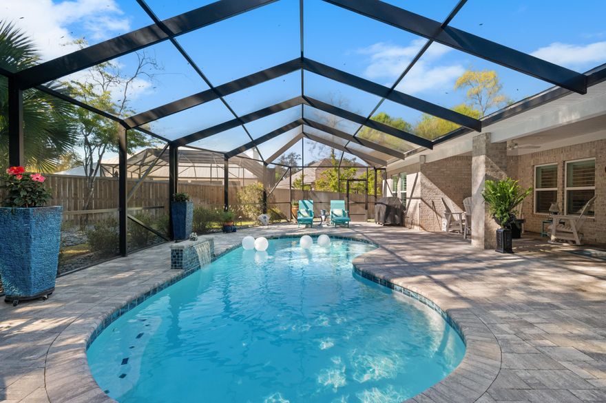 Discover this stunning 4-bedroom, 3-bathroom home featuring a private, beautifully enclosed pool, located in Niceville's highly sought-after Deer Moss Creek community. Perfectly positioned on a premium lot with no rear neighbors and situated on a half cul-de-sac, this home offers both privacy and a safe, low-traffic setting ideal for families. Thoughtfully designed with both style and functionality in mind, the home features a spacious open-concept layout and a desirable split floor plan for added privacy. A versatile formal dining room or office provides flexible living space, while the breakfast area is highlighted by an updated chandelier. Elegant wood plantation shutters throughout add timeless character and charm. Interior highlights include 8-foot doors, a beautiful 8-foot sliding glass door and crown molding throughout the main living areas and private suite. High-end finishes include tile and engineered hardwood flooring, custom upgraded cabinetry, stylish fixtures, and eye-catching shiplap accents.
The thoughtfully designed kitchen has been enhanced with upgraded hardware, soft-close hinges, glass-front cabinetry, and a gorgeous kitchen island flowing seamlessly into the main living spaces--perfect for both everyday living and entertaining. The butler's pantry is equally impressive, featuring upper and lower cabinet lighting, expanded storage, and both a wine refrigerator and a separate beverage cooler.
The luxurious primary suite offers a spa-like retreat, complete with a rain head shower. Additional upgrades throughout the home include a custom-designed primary closet with wood shelving and built-ins, updated bathroom mirrors, and a redesigned mudroom with added cabinetry for optimal storage.
Built with efficiency and convenience in mind, the home includes impact-resistant windows, and a gas tankless water heater. Smart and lifestyle enhancements include a Ring doorbell system with exterior cameras, surround sound in the den, and outdoor speakers on the back patio and pool area.
Step outside to your private backyard oasis featuring a stunning gunite in-ground pool, expansive paver decking, and a fully screened enclosure. The outdoor space is further enhanced with a gas line for grilling, extended green space ideal for pets or play, professional landscaping, and accent lighting--perfect for relaxing or entertaining.
Additional upgrades include a professionally coated garage floor, custom draperies, and whole-home wood plantation shutters, including the garage.
This exceptional home perfectly blends comfort, craftsmanship, and modern elegance in one of Niceville's most desirable communities.