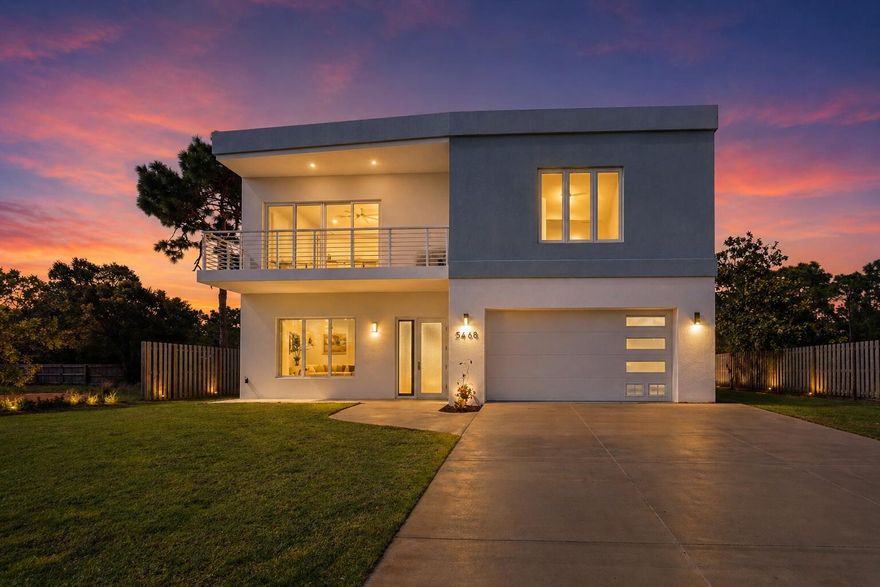 Experience modern Gulf Coast living at 5468 Cimmeron Ct in Gulf Breeze. This stunning 4-bedroom, 3.5-bathroom home, built in 2023, showcases a beautiful kitchen equipped with stainless steel appliances and a spacious island. The open concept floor plan features soaring ceilings and a cozy fireplace, creating an inviting atmosphere. Retreat to the large primary suite complete with a walk-in closet and luxurious bathroom featuring a soking tub, walk-in shower and heated tile floors.

Built with Insulated Concrete Form (ICF) construction and impact-resistant windows and doors, this home is designed for strength, energy efficiency and year-round comfort - making it one of the most resilient and secure homes available in Gulf Breeze.