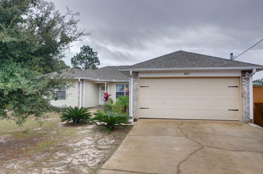 You do not want to miss this adorable cul de sac home in a fantastic location in East Navarre! Walk in the door and the interior features an open split bedroom floor plan, with new laminate flooring (no carpet in the house!) and a vaulted ceiling showing off new light fixtures. It has a NEW ROOF just installed in January, as well as new stainless appliances in the kitchen. The master provides plenty of room for your king sized bed and furniture, and in the master bath you'll find a long double vanity and an additional walk in closet to add to the other closet in the bedroom. This unique lot is almost half an acre, and boasts a new privacy fence enclosing the huge backyard, as well as a new patio (part of which is covered). Make an appointment to see this one before it's gone! Outdoor shed is "as is". See Seller's Disclosure for a full list of updates and upgrades.