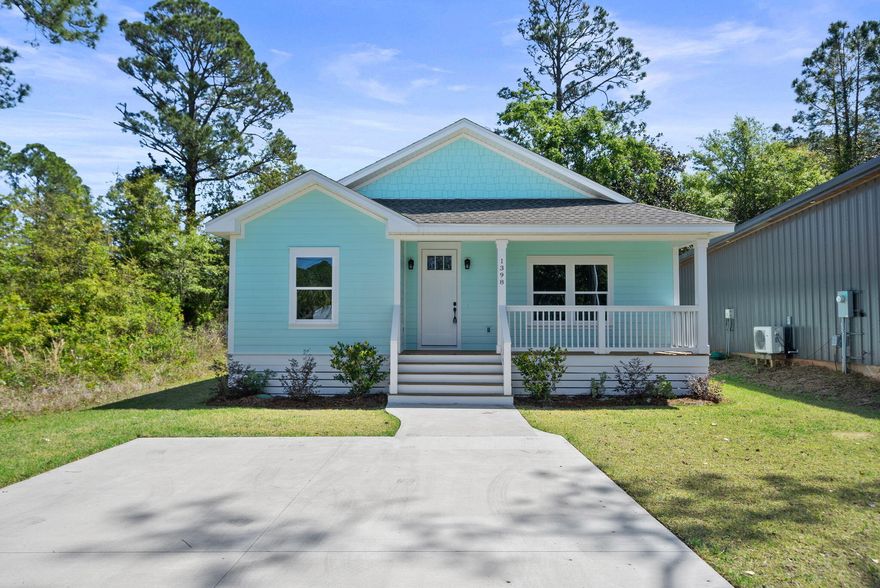 Brand new Florida cottage in Santa Rosa Beach, no HOA and STR allowed, built by an experienced local builder focused on clean execution and low-maintenance living - so you can skip the project list and go straight to enjoying why you moved here in the first place. Built in 2024, this 3-bedroom, 2.5-bath home offers 1,372 square feet of well-planned space with an open layout that actually makes sense - no wasted corners, no awkward transitions. The kitchen keeps it modern and sharp with white shaker cabinetry, quartz countertops, stainless appliances, and a classic subway tile backsplash. Durable luxury vinyl plank flooring runs throughout, because real life happens and floors should be able to handle it - even if you're still sweeping up sand from your beach days.

 The primary suite features a double vanity, large format tile, and a walk-in shower with glass enclosure, finished in a style that feels current without trying too hard. Secondary spaces follow the same theme - clean, bright, and ready for whatever direction the first owner takes. Out front, a covered porch gives you just enough space to sit, sip your coffee, and pretend you're going to start a morning routine.

The lot is low-maintenance, which means more time at the beach and less time negotiating with your weeds. No HOA. Read that again. Fewer rules, fewer surprises, and more flexibility to use the property in a way that fits your lifestyle. Short-term rentals are allowed, offering flexibility for primary living, second home use, or investment potential.

Ample parking space and only 1.5 miles to the beach. Located in Santa Rosa Beach with convenient access to everyday essentials, dining, and the reasons people move here in the first place.

All information is deemed reliable but not guaranteed. Buyer to verify all details, including but not limited to measurements, features, zoning, and permitted uses.
