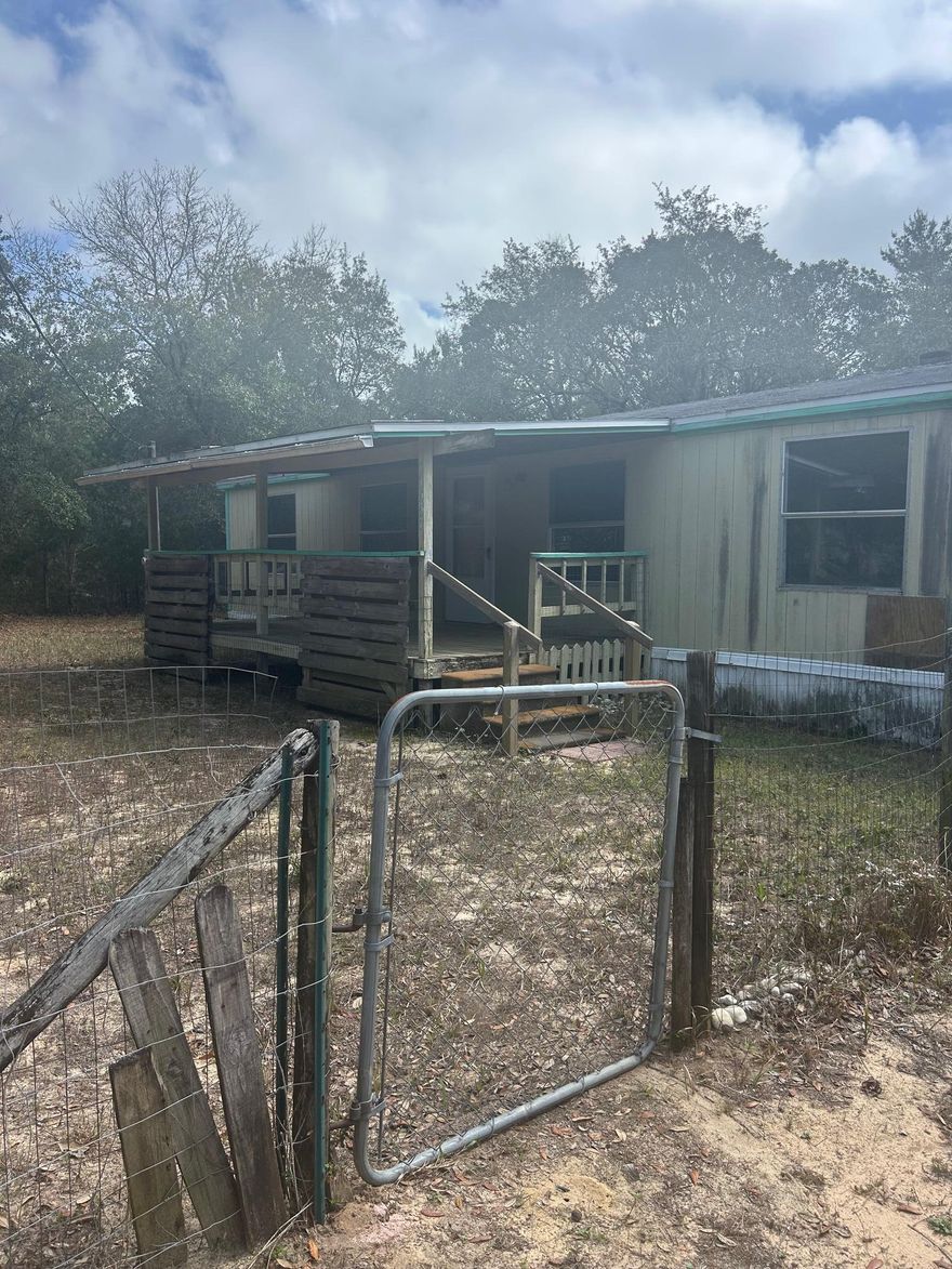 Under contract with a 72 hour kickout clause. Uninhabitable in its present condition. A 3 bedroom, 2 bath,  totally gutted mobile home on 1/3 of an acre and close to EVERYTHING Emerald Coast! This is your chance to put in some sweat equity and build yourself a little beach getaway. All utilities are on site, the property is partially fenced and there are two shed. Come see what this property has to offer you and your life sytle or the listylr you invision!