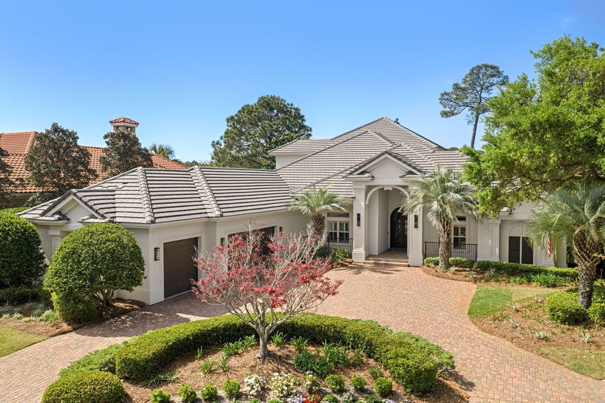 Stunning Boswell Builder's built home offering the perfect combination of a very well thought out and flowing floor plan ,perfect for relaxation and entertaining along with one of the finer golf course lots with lake views in Burnt Pine. This golf course home offers a kitchen that is a chef's dream, featuring double convection ovens; six burner gas stove with pot filler and custom designed hood; plenty of cabinetry; beautiful granite countertops; large kitchen island and Viking refrigerator. The master bedroom, located on the first floor, overlooks the pool and leads into a master dressing room with his and hers walk in closets. The master bath offers double marble vanities, walk-in shower and tub. Also 2 other guest suites on the 1st floor, Bring the outside in with over 2,200 sq.ft. of screened Lanai that contains a sparkling pool accompanied with waterfall; outdoor kitchen; fireplace with TV alcove and plenty of covered room for seating, and enjoying views of the golf course. The guest quarters, on the second floor, is equipped with a bedroom, full bath, bonus room and a covered balcony running the length of the home for even more capturing views of the golf course. Additional appointments to this beautiful home are many built ins; extensive crown molding; plantation shutters; extra storage areas above garage and off of bonus room; office with built-in cabinetry, wine room with wine cooler, racks and wrought iron door; crown molding throughout; Travertine floors; elegant dining room; den; living room; powder room, laundry/craft room and 3 car garage. Come and see this home. It will certainly please.
