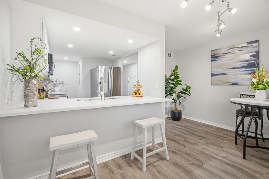 Beautiful updated end unit  conveniently located in Shalimar. This stunning remodeled townhome offers stylish upgrades perfect for relaxing, entertaining, or simply enjoying every day in comfort and style. Step through the front door into a bright living space with fresh paint and luxury vinyl plank flooring.The fully updated kitchen includes new stainless steel appliances, quartz countertops and modern cabinetry. Home has new roof, HVAC and water heater. The backyard is fully fenced.