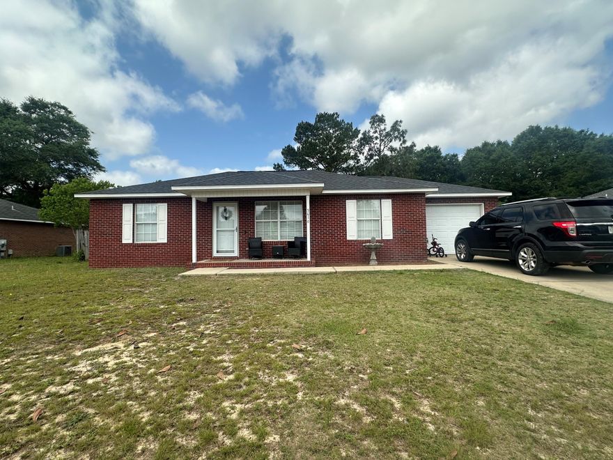 Welcome to this well maintained all brick 3-bedroom, 2-bath home, situated on a .26 - acre lot in North Crestview. With vinyl plank flooring throughout. The primary suite features a private bath with a walk in closet, creating a comfortable retreat. A desirable split floor plan, that includes an glass sliding door leading to the fully fenced backyard. The Kitchen is equipped with stainless steel appliances, and a large pantry.
