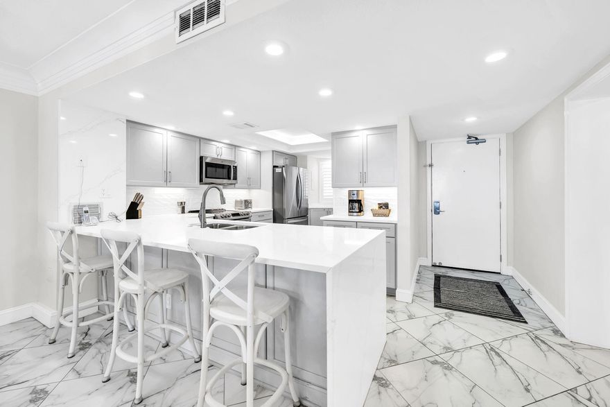 Welcome to your completely remodeled Gulf-front retreat--priced to sell and ready to deliver both luxury living and strong investment potential. Nestled within the privately gated Edgewater community, this stunning second-floor condo offers the perfect blend of elevated design and effortless beach access--just steps from the sand and resort-style pools.

Inside, you'll find designer flooring throughout and a show-stopping kitchen featuring endless custom quartz countertops, artisan-crafted soft gray cabinetry, a custom backsplash, and sleek stainless steel appliances--curated for both style and function.

The spacious master suite is a true sanctuary, complete with private balcony access and sweeping Gulf views. The spa-inspired ensuite bath showcases a large walk-in glass shower. While the guest bath offers a relaxing Roman tub/shower combo. This unit comes fully equipped w/ an in-unit washer and dryer for convenience.

Step outside to your oversized Gulf-front balcony, where sunrise coffees and sunset views become part of your daily rhythm. Additional highlights include a semi-private elevator (serving only the first and second floors) and plenty of covered/garage parking spaces beneath the building + overflow parking!

Edgewater's resort amenities elevate the experience even further, with two pools, a hot tub, tiki bar, fitness center, basketball courts, shuffleboard, playground, and expansive green space--all within a gated, private beach setting.

Whether you're searching for a luxury second home or a high-performing rental, this turnkey coastal gem checks every box.