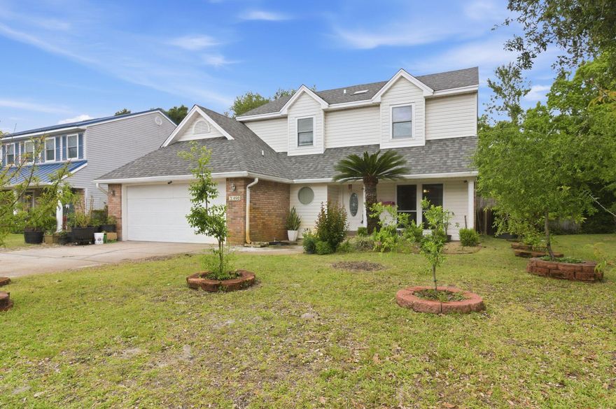 Located in a quiet subdivision, just 2 miles west of Hurlburt Field's front gate, an easy drive to shopping, dining and entertainment in Fort Walton Beach, and to the sugar white sands of Navarre Beach you could find your home sweet home in this Colonial style 2-story, 3 bedroom 2.5 bathroom home.  The first floor is complete with a large living room, separate dining room (or office), and spacious kitchen, and a half bath as well as patio area with access to the back yard. Upstairs you will find an incredible owner's suite, 2 large guest room and the guest bath.  The yard has been lovely cared for and is a gardeners paradise with fruit and flows galore!  Call your favorite Realtor and schedule a showing today!