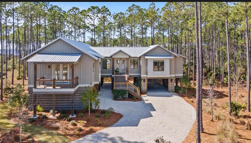 Views...views...Views

meticulously crafted  construction sits on a 1.1-acre lot with stunning views of West Bay. RiverCamps has a boat launch with direct water access to Crooked Creek, West Bay, and ultimately the Gulf of Mexico-offering unmatched access to some of the area's most scenic waterways. Boat to Uncle Ernie's Restaurant and Shell Island in 15 minutes! Enjoy kayaking, paddleboarding, fishing, or simply enjoy water views from your living room. This gated, luxury community also has a wildlife sanctuary that sprawls 1,500 acres. Residents can enjoy miles of trails that wind through the community, bird watching, camping, and pickle ball. A brand new community pool is finished.
