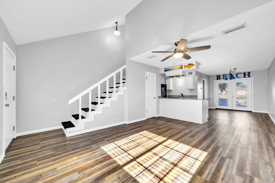 RENTAL SEASON IS HERE! Now is the time to buy your investment property, put in your own touches, and get ready to make money, or get ready to finally live the beach life you've always wanted! Short term rentals are allowed. There is no HOA, so no costly hoa dues or assessments! Across the street from beach access #11, you can hear the waves, walk across and put your toes in the sand, watch the sunset every evening, pick from numerous local pub & grills to listen to live music out on the patios while you enjoy the sunshine, and so much more! This is your opportunity to have an affordable home across the street from the world's most beautiful beaches!! BRING US AN OFFER! This adorable townhome 2 bedrooms, 1 and 1/2 baths, fresh paint throughout, roof 2022, HVAC 2019, water heater 2019, new granite countertops in the kitchen, lvp & tile flooring throughout. The back yard area has space for sitting and gardening areas, or even a jacuzzi. The only thing missing is you! This is a must see! Call your favorite realtor to schedule a showing! All information is approximate and should be verified by buyer if important.