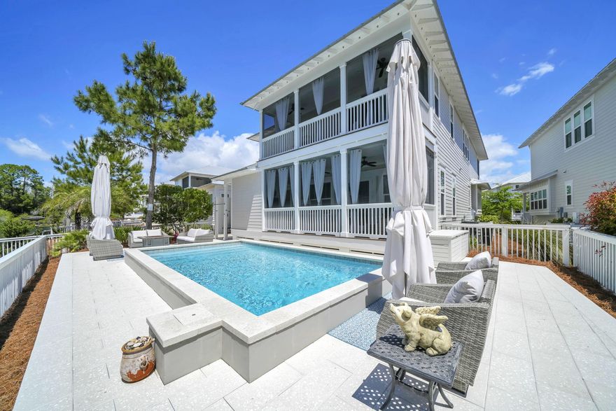 Your NatureWalk Nest Awaits! Experience refined coastal luxury & the pinnacle of coastal elegance in this impeccably curated, move-in-ready retreat, perfectly suited as a private sanctuary or premier investment property. Ideally positioned on a desired lot with easy access to pickleball and amenities within the highly sought-after community of NatureWalk Seagrove, this exceptional residence offers effortless access to the world-renowned beaches of 30A, including Seagrove, Seaside, WaterColor & Grayton Beach along with upscale dining, boutique shopping & vibrant entertainment. Step into your own private resort-style oasis, where a heated saltwater pool, expansive lounging areas, a cozy firepit, outdoor shower, & an inviting screened porch create unparalleled outdoor living experiences. Thoughtfully designed for health, relaxation & recreation the grounds also feature a climate-controlled lockout and a dedicated space for leisure activities. The tranquil backyard showcases serene water views and native landscaping, all bordered by the protected beauty of Point Washington State Forest, offering rare privacy and a true connection to nature. This home lives large & reflects a commitment to both sophistication & wellness, with no carpet & premium engineered wood & tile flooring throughout. The expanded & upgraded chef's kitchen is a statement of style & function, featuring stainless steel appliances, professional 33' refrigerator & freezer units, newly upgraded custom cabinetry, gas cooking, abundant & expansive storage, exquisite finishes, and a warm, inviting hearth. Professionally designed and appointed, the home offers impressive gathering spaces, bespoke finishes, & a grand dining area ideal for entertaining. Guests enjoy a private retreat with scenic views & private outdoor balconies. Additional features include a one-car garage with custom storage and a private driveway with an extraordinary capacity for up to five vehicles--an exceptional luxury in Seagrove! Meticulously maintained and beautifully appointed, this residence delivers a seamless blend of comfort, privacy, and elevated, healthy, coastal living. Private tours are available for this exceptional offering.