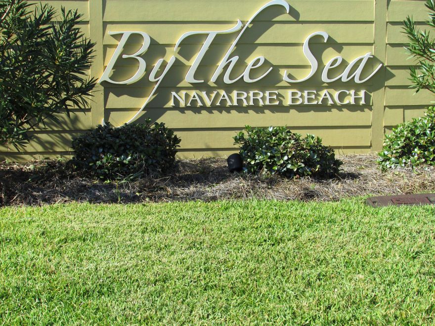 By the Sea is a gated sound side community located on the west end of beautiful Navarre Beach. Enjoy the 12 mile drive through the Gulf Islands National Seashore and marvel over the untouched white sandy beach against the emerald surf. This end lot is within steps of the sound and is one of the last available lots for sale on Seaside Circle. Owners have deeded access to the Sound, a community pool, a pool house and a hot tub. Architecural plans are available for you to build the home of your dreams 'By the Sea!'