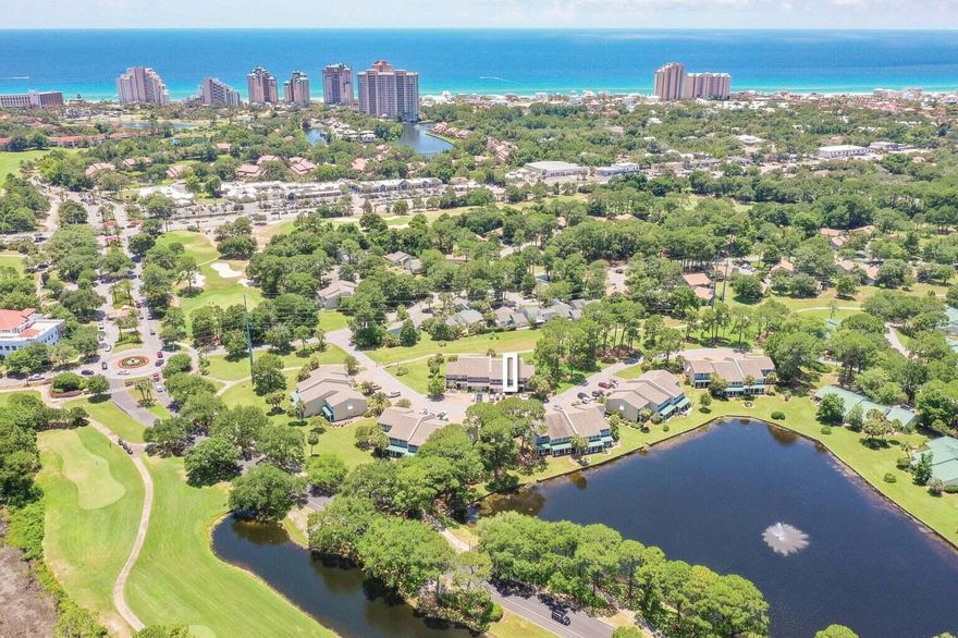 UPDATED! This beautifully transformed 2BR, 3BA condo offers the perfect blend of comfort and modern style, FULLY FURNISHED including a GOLF CART perfect for enjoying the resort lifestyle. The inviting kitchen has beautifully updated cabinetry with glass doors, stainless steel appliances,   granite countertops and newly installed sink, disposal, lighting and fixtures.  A convenient breakfast bar & pantry add functionality and style, making this kitchen a perfect space for preparing meals. On the main level, you'll find an updated full bathroom, dining, and living area with newly replaced furniture (2025) and newly installed glass sliding door that opens to a screened-in patio, complete with a grill. Luxury vinyl flooring is installed throughout the living areas and bedrooms, to ensure low maintenance and enhanced hygiene. Upstairs, two spacious bedrooms each with their own private ensuite bath, which have been updated. The primary bedroom also includes a private balcony, providing the perfect spot to enjoy a glass of wine and watch the sunset. New mattresses (2025) in the bedrooms add to your comfort. Two large exterior closets provide ample storage for all your resort items, including beach toys, bikes, and lounge chairs. This condo has undergone significant upgrades, including a full wiring update and the installation of a new breaker box. The HVAC system was replaced in 2020, the hot water heater in 2023, and the air ducts have been professionally cleaned after renovations were completed. Enjoy both CABLE and INTERNET SERVECES included in your monthly fees. As an owner you can experience all the fabulous amenities of the Sandestin Golf & Beach Resort, including tennis and pickleball courts, four golf courses, shopping, dining, boating, and watersports at Baytowne Wharf and Marina. The condo's golf cart allows for quick access through the tunnel, making it easy to reach the beach in just minutes. Although this condo is not currently used as a rental, it is ideal as an investment property or a perfect second home.
