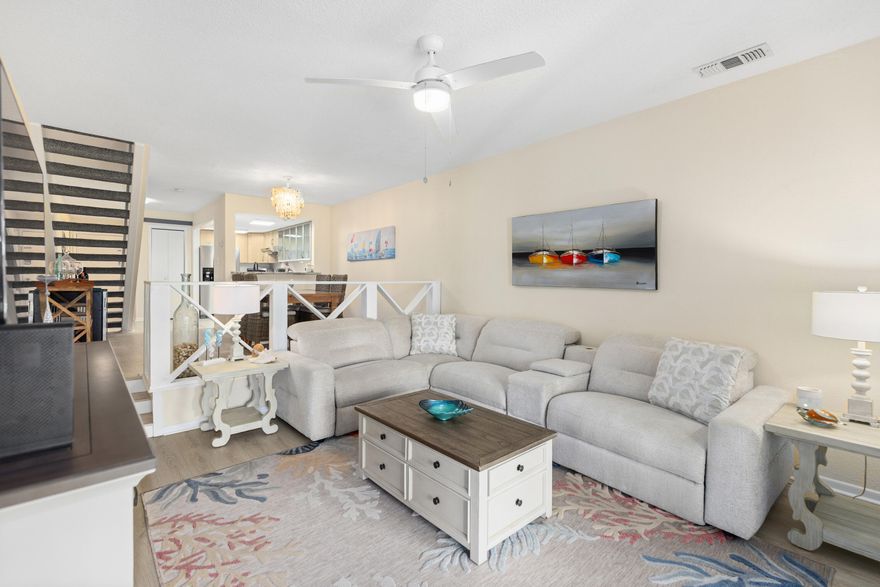 UPDATED! This beautifully transformed 2BR, 3BA condo offers the perfect blend of comfort and modern style, FULLY FURNISHED including a GOLF CART perfect for enjoying the resort lifestyle. The inviting kitchen has beautifully updated cabinetry with glass doors, stainless steel appliances,   granite countertops and newly installed sink, disposal, lighting and fixtures.  A convenient breakfast bar & pantry add functionality and style, making this kitchen a perfect space for preparing meals. On the main level, you'll find an updated full bathroom, dining, and living area with newly replaced furniture (2025) and newly installed glass sliding door that opens to a screened-in patio, complete with a grill. Luxury vinyl flooring is installed throughout the living areas and bedrooms, to ensure low maintenance and enhanced hygiene. Upstairs, two spacious bedrooms each with their own private ensuite bath, which have been updated. The primary bedroom also includes a private balcony, providing the perfect spot to enjoy a glass of wine and watch the sunset. New mattresses (2025) in the bedrooms add to your comfort. Two large exterior closets provide ample storage for all your resort items, including beach toys, bikes, and lounge chairs. This condo has undergone significant upgrades, including a full wiring update and the installation of a new breaker box. The HVAC system was replaced in 2020, the hot water heater in 2020, and the air ducts have been professionally cleaned after renovations were completed. Enjoy both CABLE and INTERNET SERVICES, as well as all exterior maintenance, pest control, and lawn care included in your monthly fees. As an owner you can experience all the fabulous amenities of the Sandestin Golf & Beach Resort, including tennis and pickleball courts, four golf courses, shopping, dining, boating, and watersports at Baytowne Wharf and Marina. The condo's golf cart allows for quick access through the tunnel, making it easy to reach the beach in just minutes. Although this condo is not currently used as a rental, it is ideal as an investment property or a perfect second home.