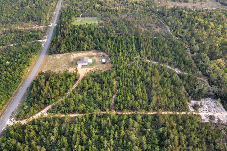 Welcome to 2595 Long Rd, a 2023 built Philip Day resale home set on 11.05 private acres, offering a refined take on country living with modern efficiency and design.
This property delivers true freedom with no HOA and is fully equipped for a self sufficient lifestyle, featuring private well and septic with no water bill. The land is usable and functional, ideal for a homestead, animals, or simply enjoying space and privacy.
Inside, the home features high ceilings, a bright open concept layout, and a clean, modern finish with no carpet throughout. Built for efficiency, it offers low electric costs without compromising comfort or style.
The outdoor setup is just as intentional. A covered back patio with roller shades and an outdoor TV creates a seamless extension of the living space. Additional features include mature trees, chicken coop, storage shed, and a hot tub.
Step into a place that instantly feels like home. This gem welcomes you with warmth, comfort, and inviting spaces designed for everyday living and lasting memories. From cozy evenings in the living area to gatherings filled with laughter, every corner of this home feels special and ready for its next chapter. This home offers the perfect blend of tranquility and convenience.