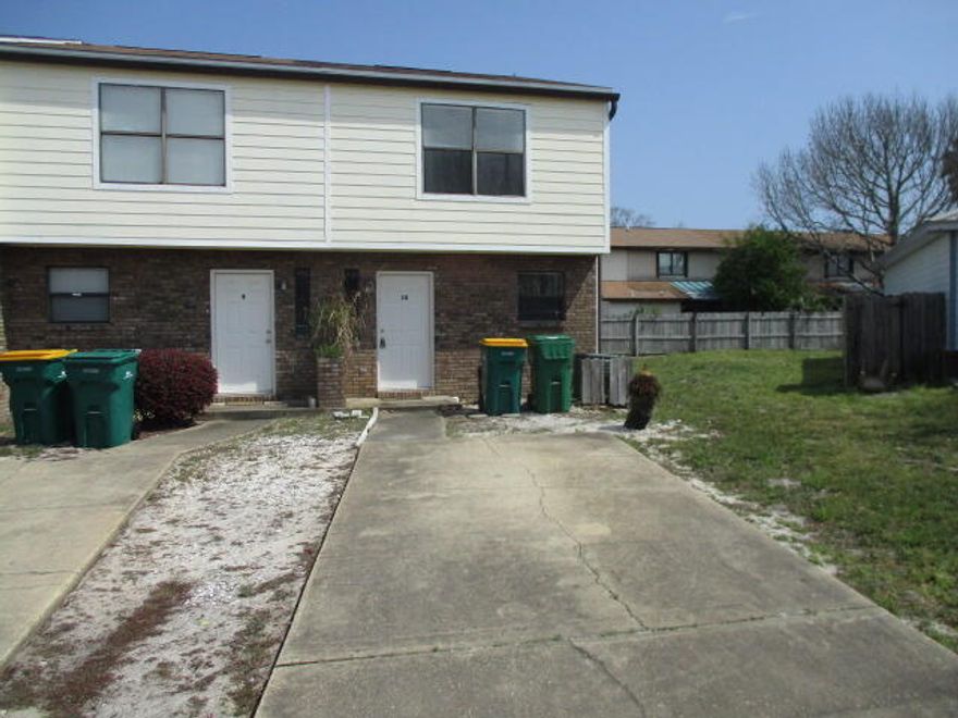 LOVELY TOWNHOME in a GREAT LOCATION IN DESTIN.Very centrally located to all the restaurants and night spots in Destin. Walk to the Harbour Walk. The downstairs has ceramic tile throughout. Carpet in all the bedrooms upstairs.There is a Interior laundry room with washer and dryer connections. Newer vanities in both bathrooms. Pest control and garbage service is included with the rent. Listing office to accompany all showings. Call our office to make an appointment today