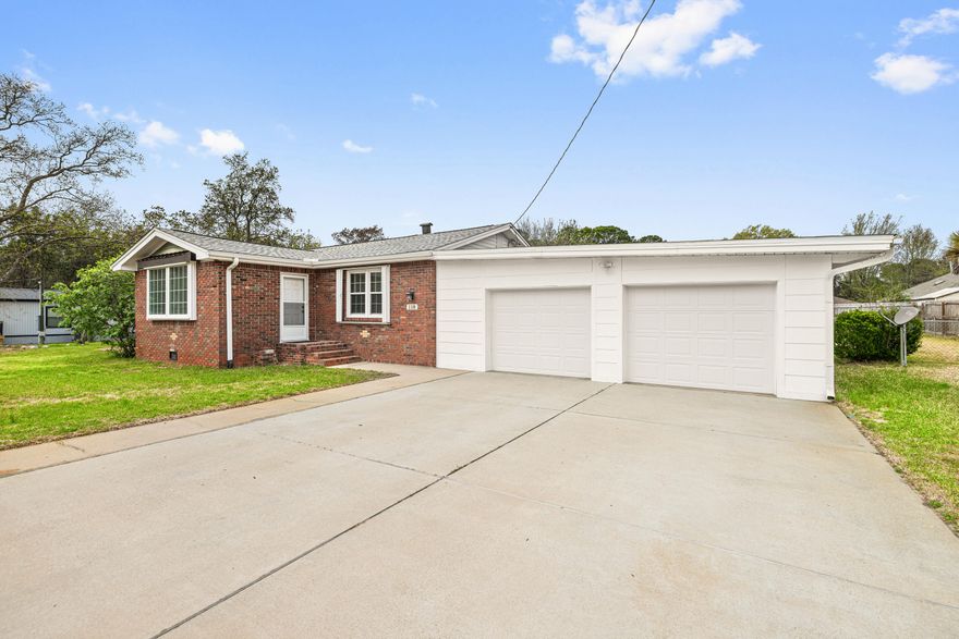 Meticulously maintained 2BR/2BA home on a spacious .46-acre lot, blends 1943 charm with fresh modern updates. Features refinished original hardwood floors, travertine, ceramic tile and LVP, updated kitchen with granite countertops, oak cabinetry, gas stove, hood vent, stainless steel appliances, and dual refrigerators. Both bathrooms have been renovated with new vanities, showers, fixtures and flooring. Major upgrades include a new 2026 roof, updated electrical, and energy-efficient windows. Additional highlights include, fresh interior paint, 2-car garage, a whole-house generator and a sprinkler system on its own well. Don't miss this move-in ready gem!