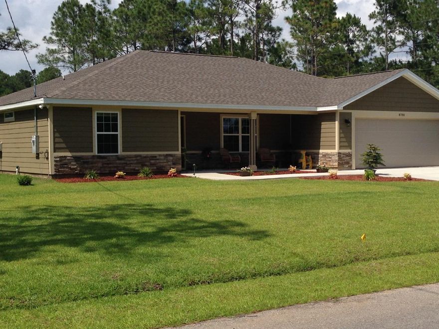 NEW CONSTRUCTION in EAST NAVARRE, this luxurious 4 bed/2 bath split floor plan home is estimated mid Dec completion..Large kitchen with Espresso custom staggered cabinets, crown molding and beautiful granite counter tops~Under mount sink and Oil rubbed bronze faucet~Corner walk in pantry~Wine fridge under the sweeping island with hop up bar and open flow to the eat in area and family room, 20 x 20 tile in the main living area,laundry and all wet areas. Large Master with Trey Ceiling & crown molding. Master bath offers a huge walk in tiled shower with detailed glass decorative inset~double granite vanity~antique bronze fittings and huge walk in closet.Front additional bedroom is 15 X 13 other bedrooms are a good size all with large double closets and ceiling fan