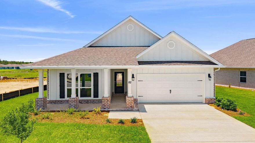 Welcome to the 82 Gray Owl Drive E, a new home at Owl's Head Farms in Freeport, Florida. This home has a large covered front porch.  The front entry hallway leads to a light-filled open-concept living area with 9' ceilings. The kitchen impresses with quartz countertops, undermount single basin sink and a dedicated water filter faucet. stainless steel appliances, and a large center island with bar seating overlooks the great room. Brushed nickel fixtures are throughout the home and include a lifetime warranty.  Adjacent to the kitchen is the dining area perfectly positioned for meals and gatherings, while the living room's wide layout invites relaxation and socializing.