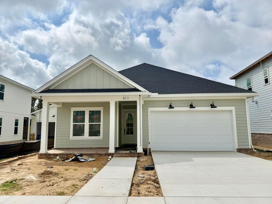 A stunning 1 story plan, the DOGWOOD, in Deer Moss Creek's newest phase, Brookfield. Est completion JUNE '26. 3-4 bedrooms (or 3 w office/bonus rm) and 2 full baths. Seller to pay 1% towards total closing costs plus $10,000 rate buy down or closing costs assistance (with another $2000 if using the preferred lender). Open floor plan on 1 floor, w/ LVP flooring in main living & tile in wet areas. Michaelangelo, white quartz counters and white shaker, wood soft close cabinetry. White custom melanine pantry shelves & custom master closet. Apron front sink in kitchen as well as a gas range, and SS appliances. Forward facing garage gorgeous curb appeal!